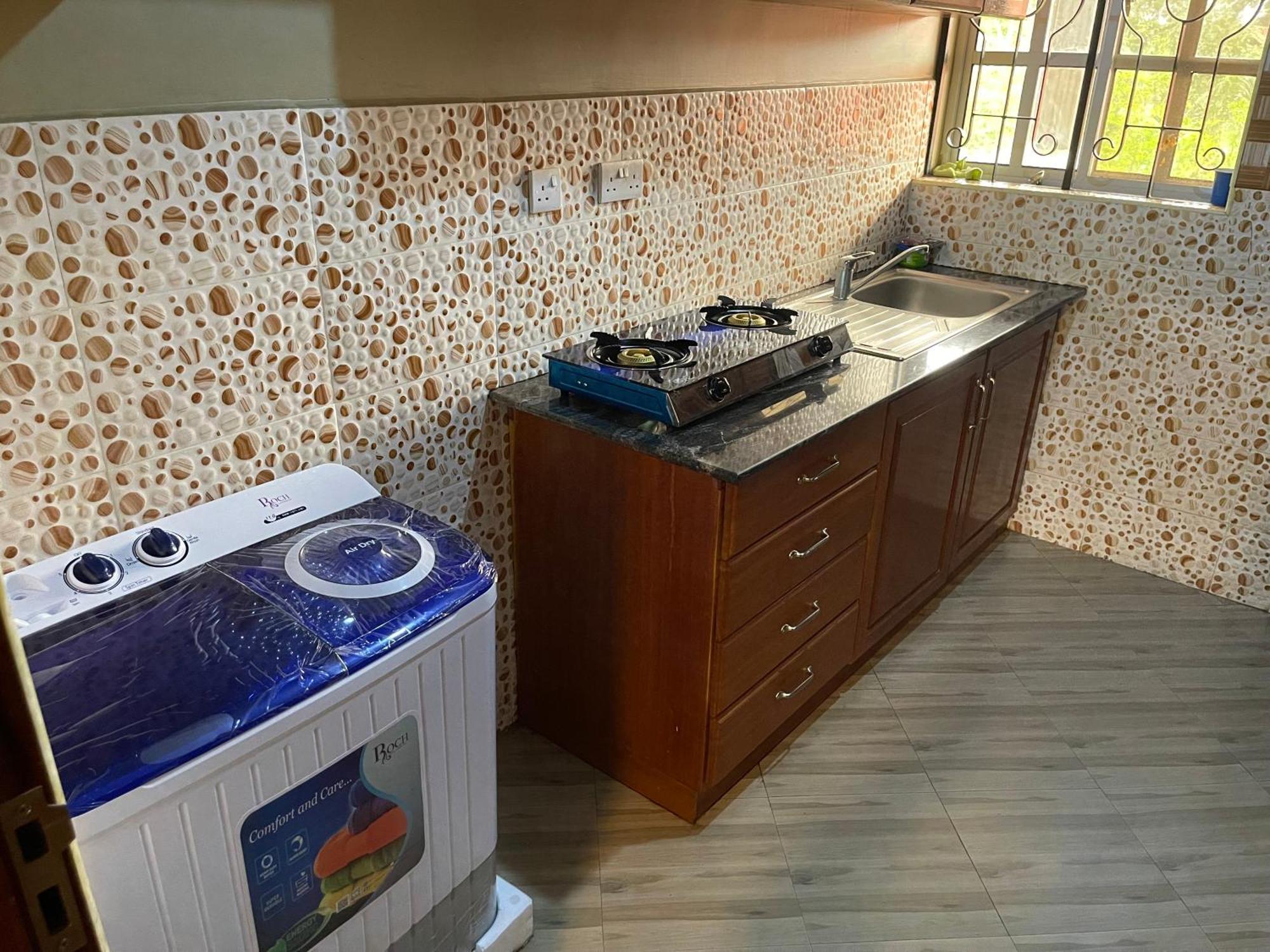 The Golden Suite Apartment Arusha Bagian luar foto